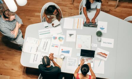 people in the office discussing a project